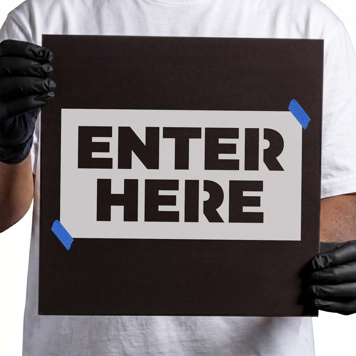 Enter Here stencil with bold block lettering in two stacked lines