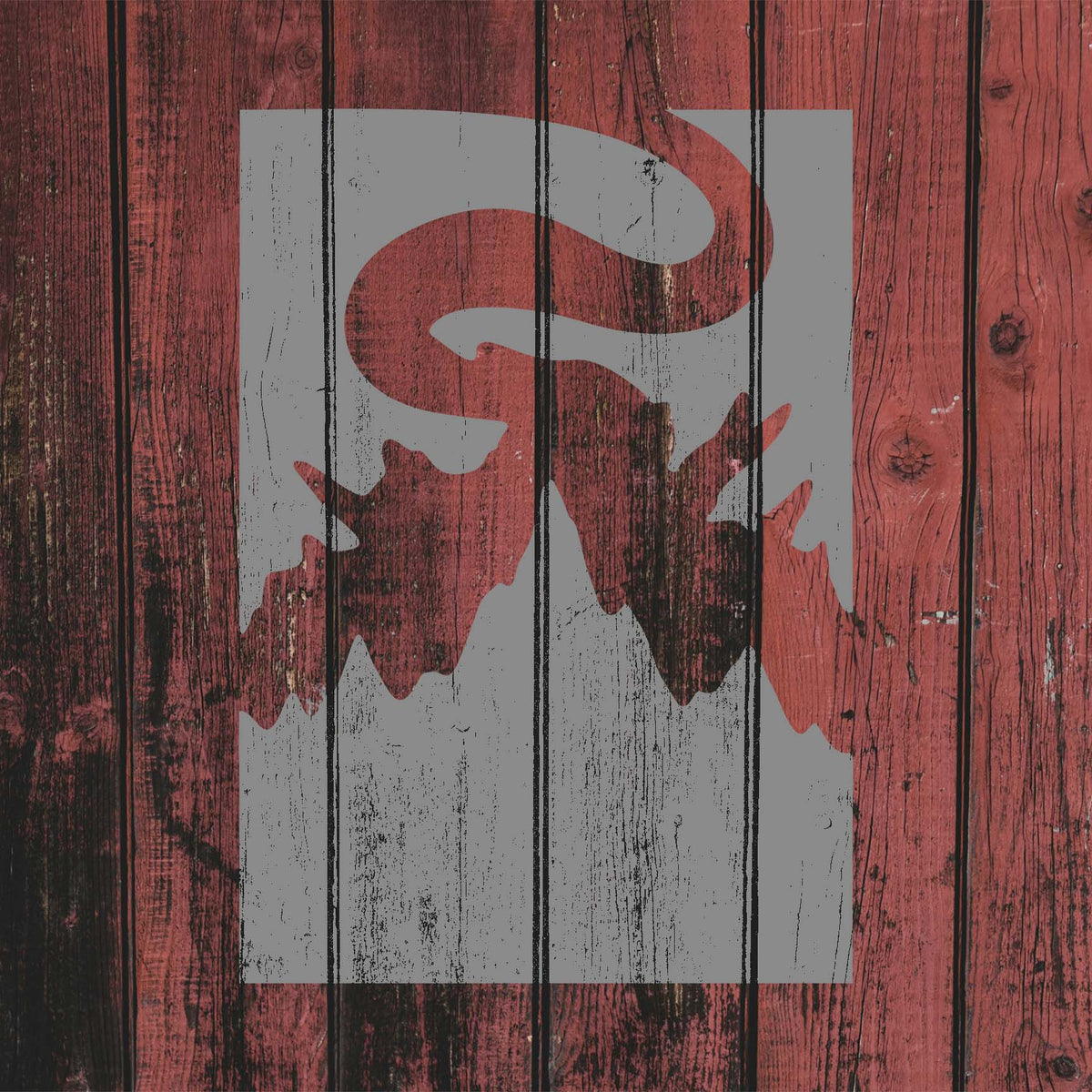 Rustic Foggy Mountain Landscape Stencil displays layered peaks across weathered red wood planks.