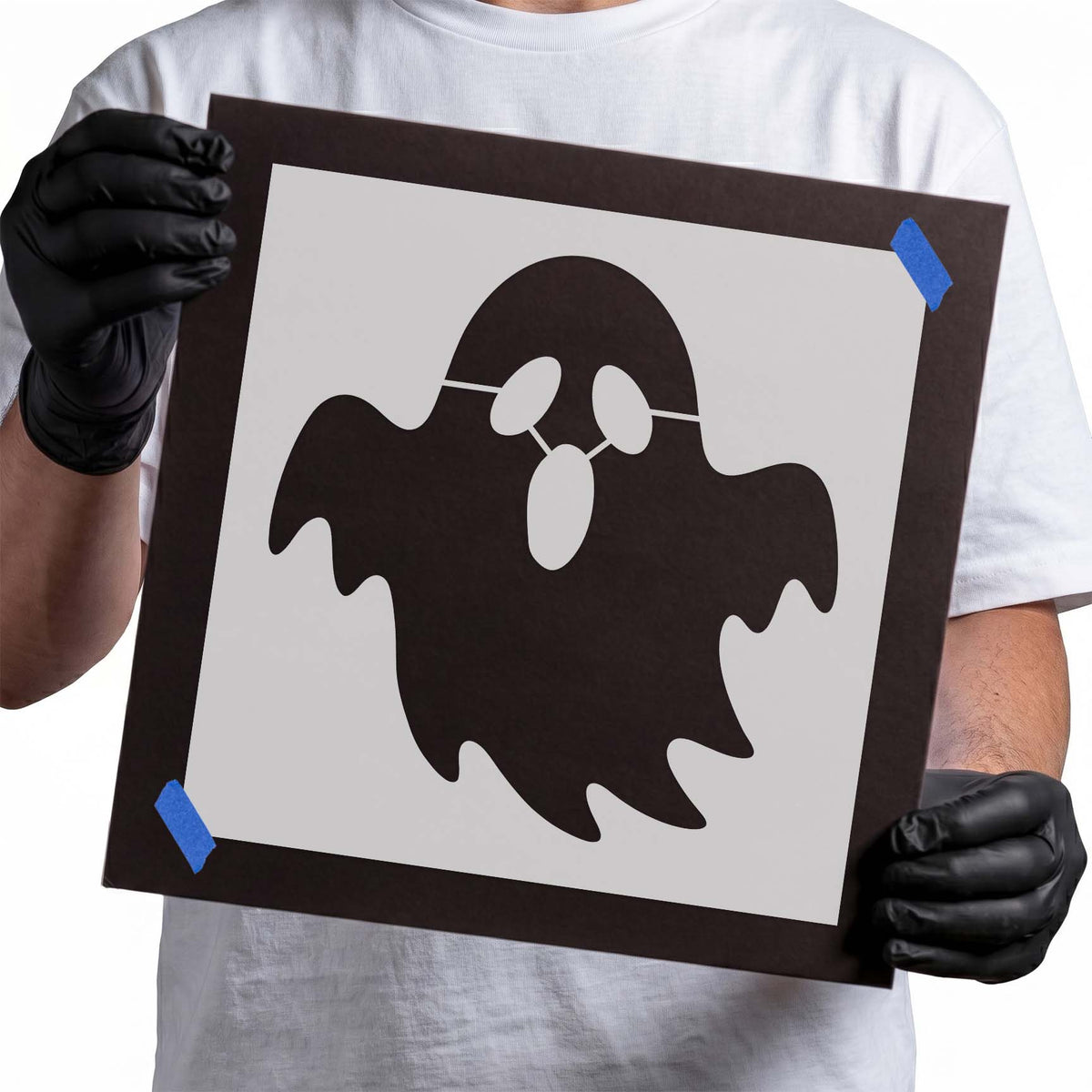 Ghost Halloween stencil featuring a floating silhouette with wavy edges and oval facial features