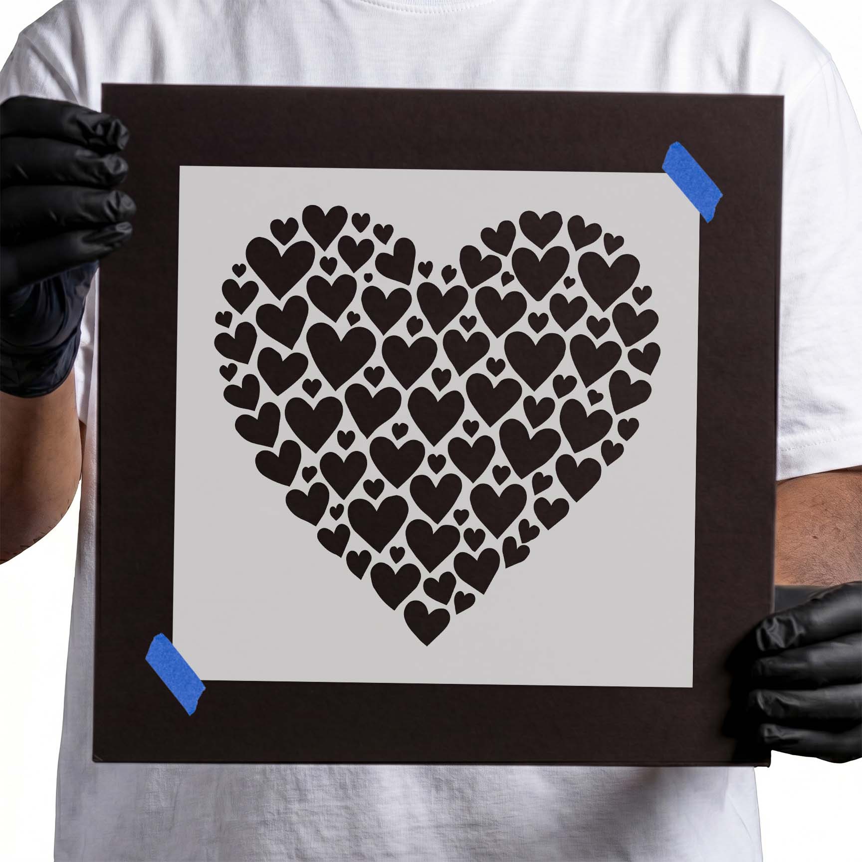 Large heart made from multiple small heart shapes
