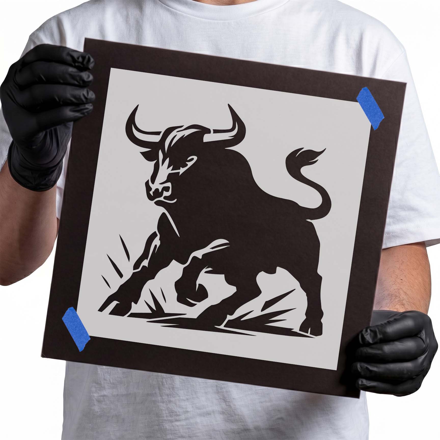 Horned bull stencil with muscular body and raised curved tail