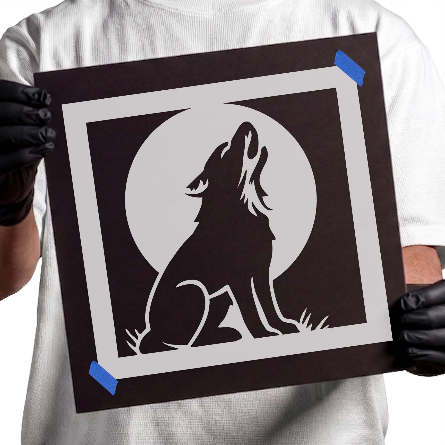 Dog silhouette howling beneath a full moon for decorative painting
