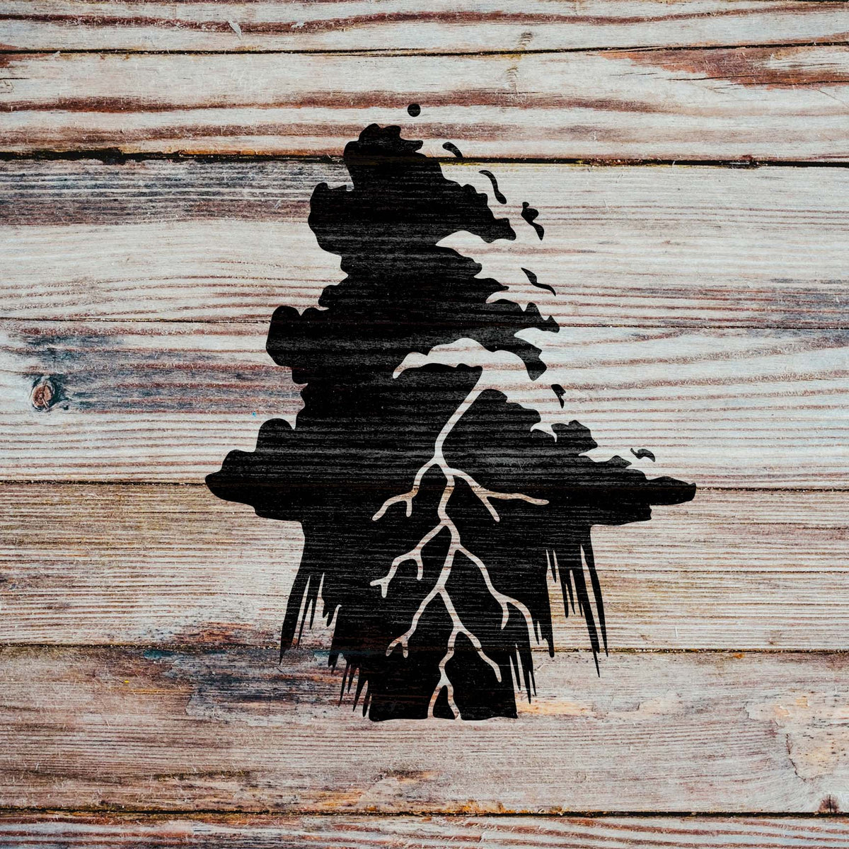 Rustic wood showcases the Lightning Storm Cloud Stencil with layered clouds and forked lightning