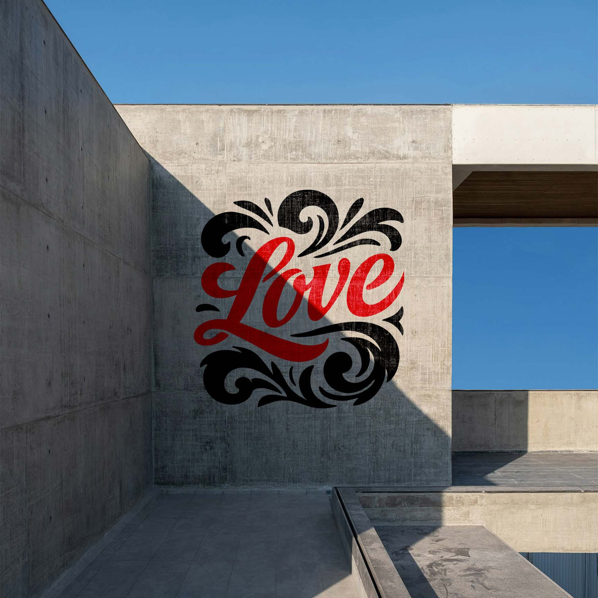 Love Script with Flourishes stencil painted boldly across a modern concrete wall