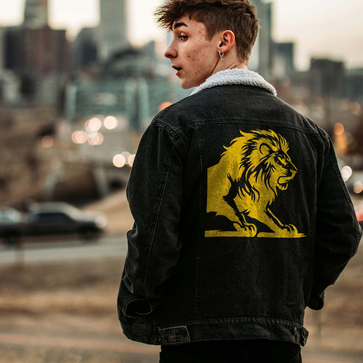 Majestic Roaring Lion Stencil in gold makes a bold statement on a black denim jacket