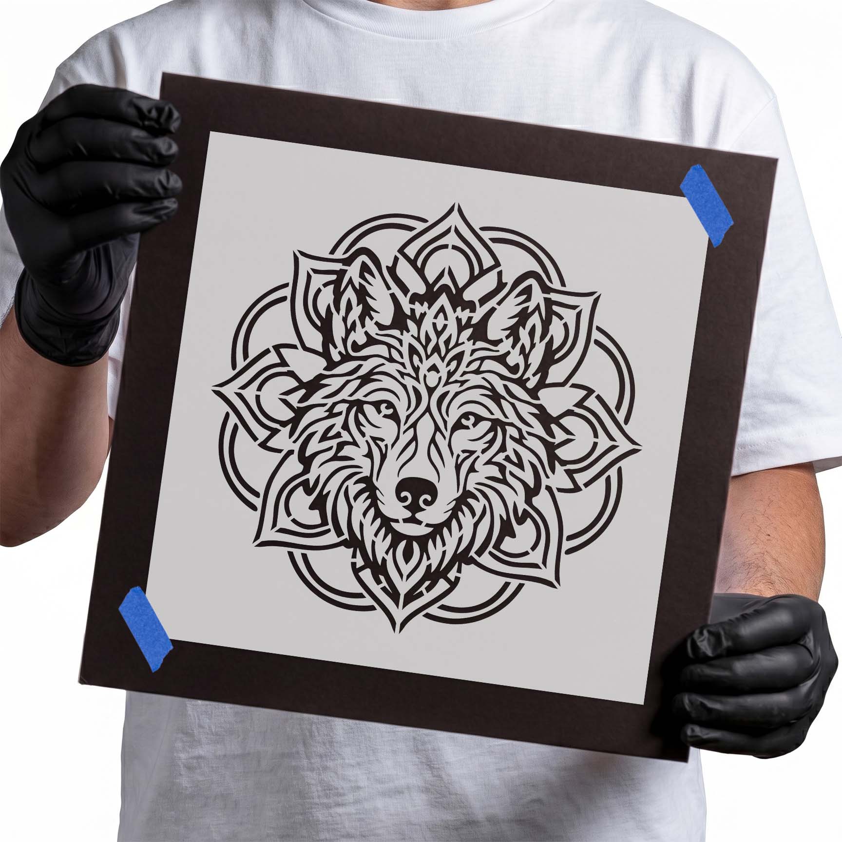 Detailed wolf head surrounded by an intricate mandala pattern stencil
