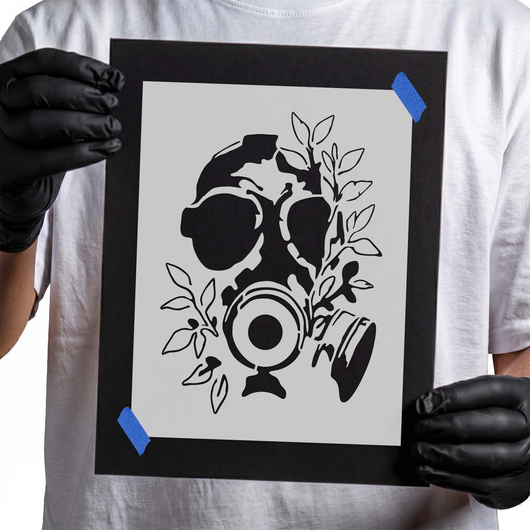 Detailed skull wearing gas mask intertwined with leafy branches and foliage
