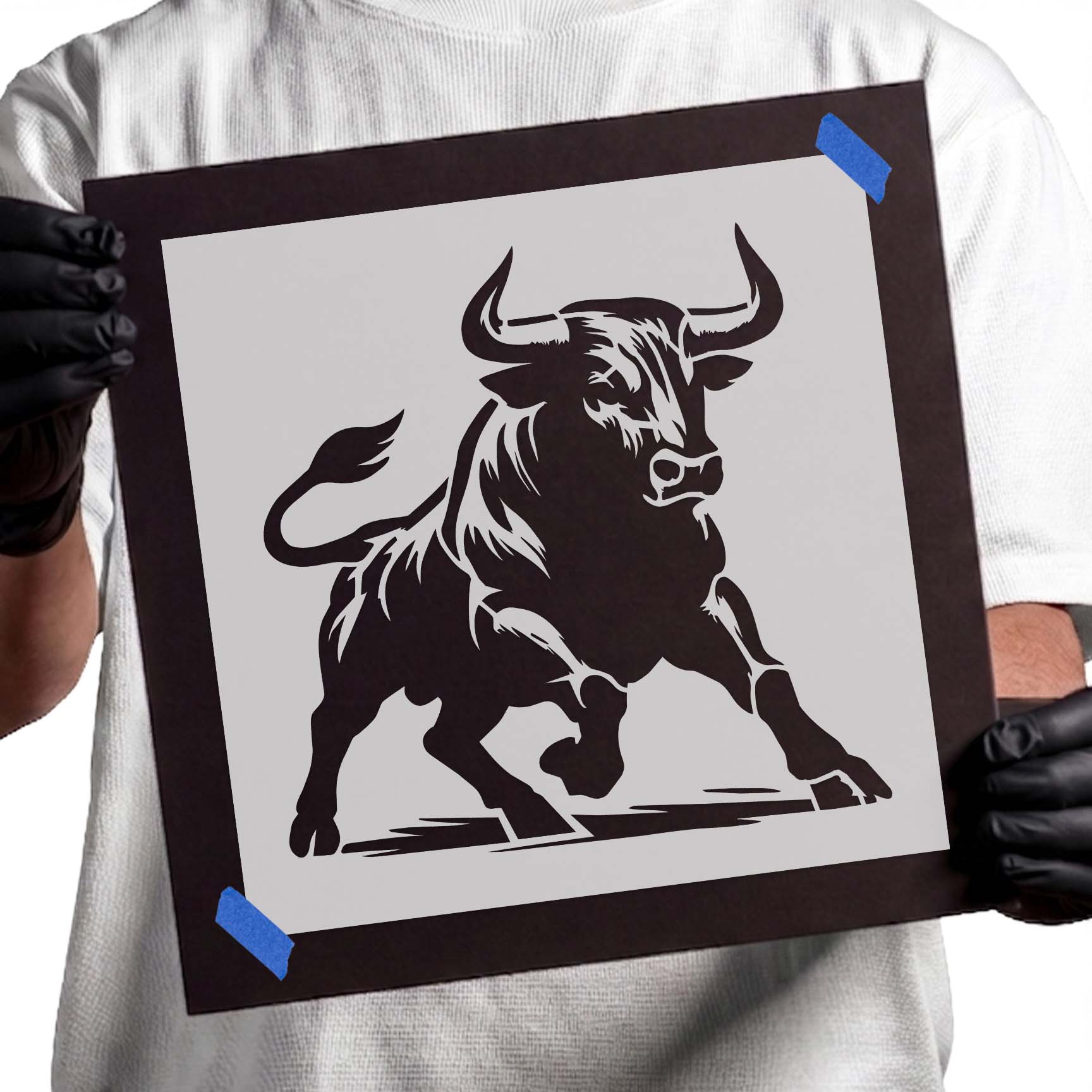 Raging bull in a powerful charging stance stencil
