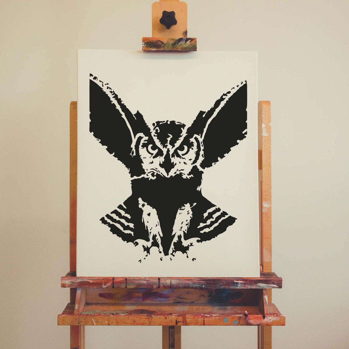 Sinister Owl Stencil spreads its wings in a dramatic black design on canvas