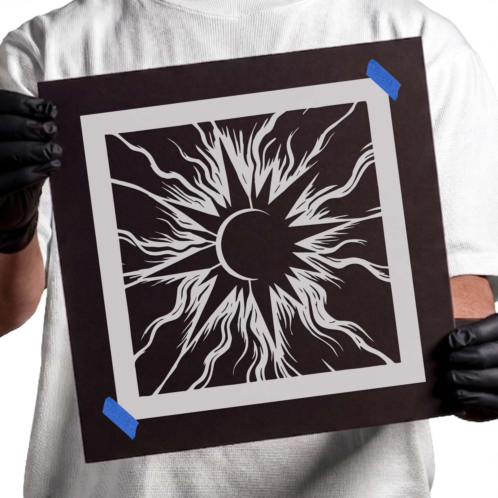 Solar eclipse with flowing radiant sun rays stencil design