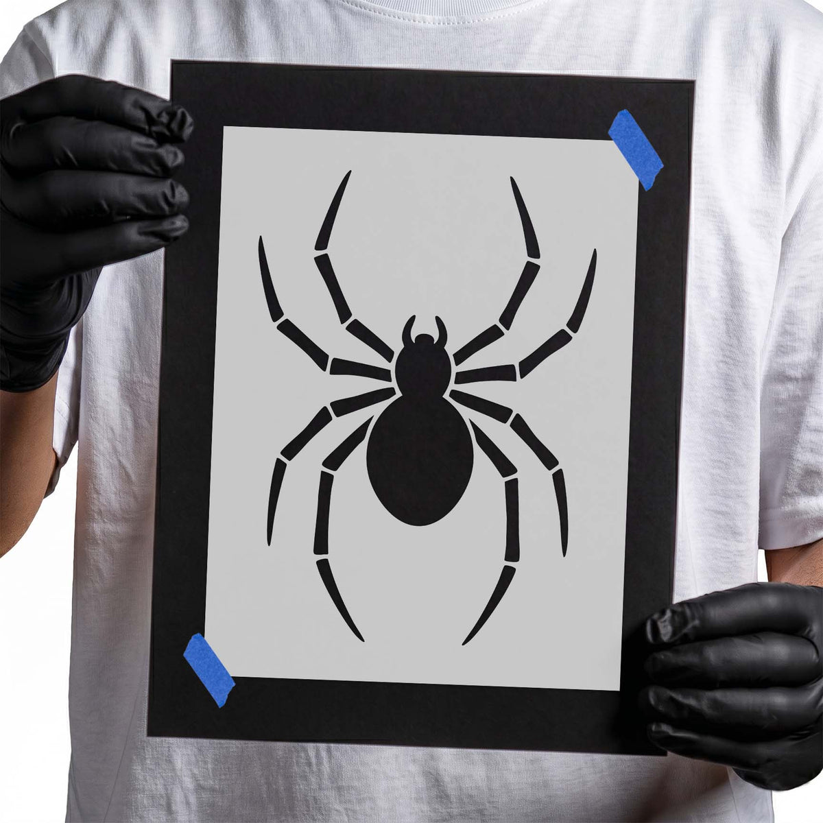 Creepy spider Halloween stencil showing eight long segmented legs and a bold oval body
