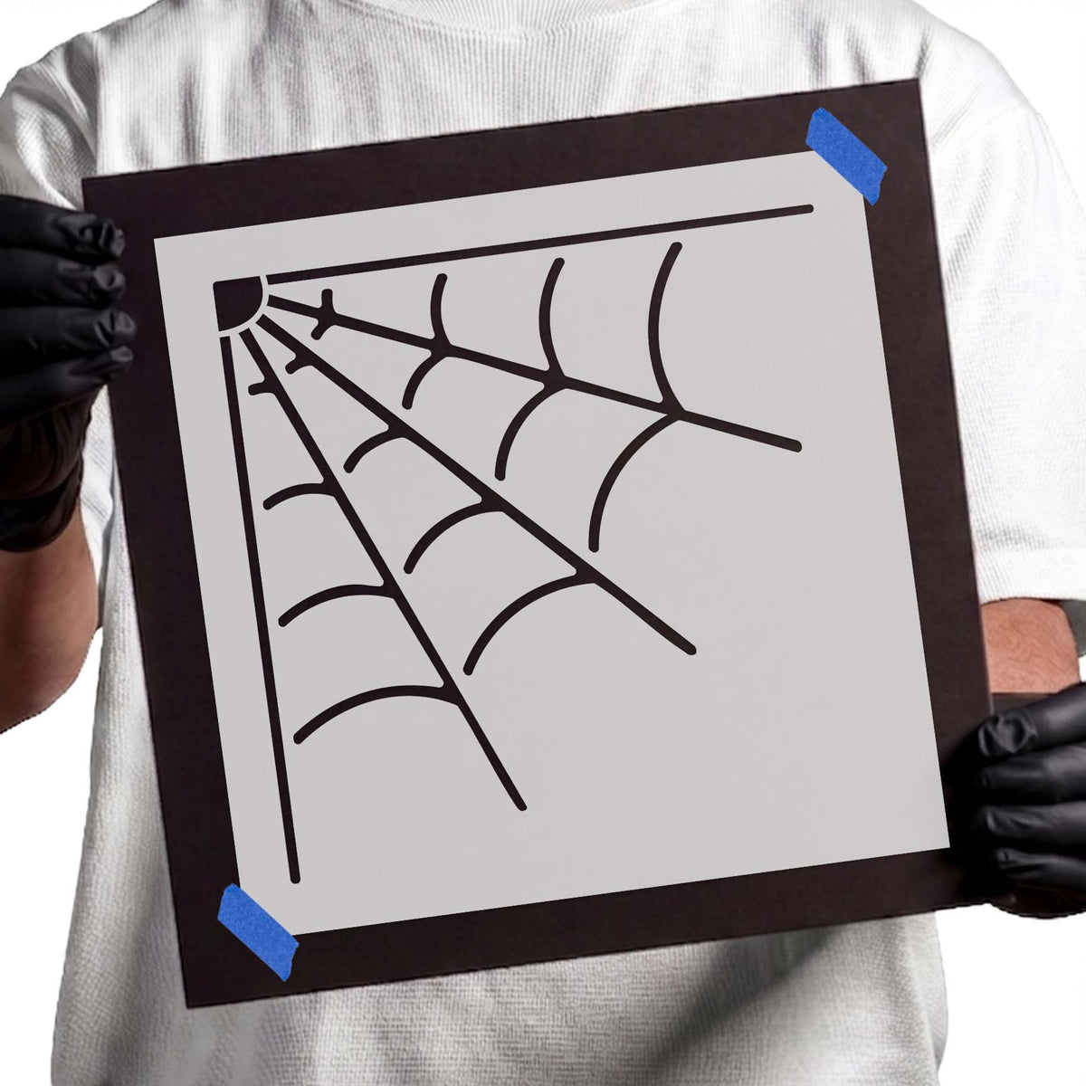 Spider web Halloween stencil with corner web strands and curved sections