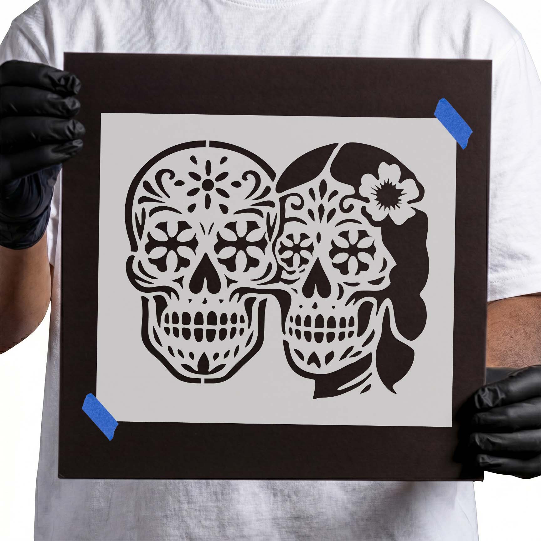 Sugar Skull Couple Stencil featuring two decorative Día de los Muertos skulls