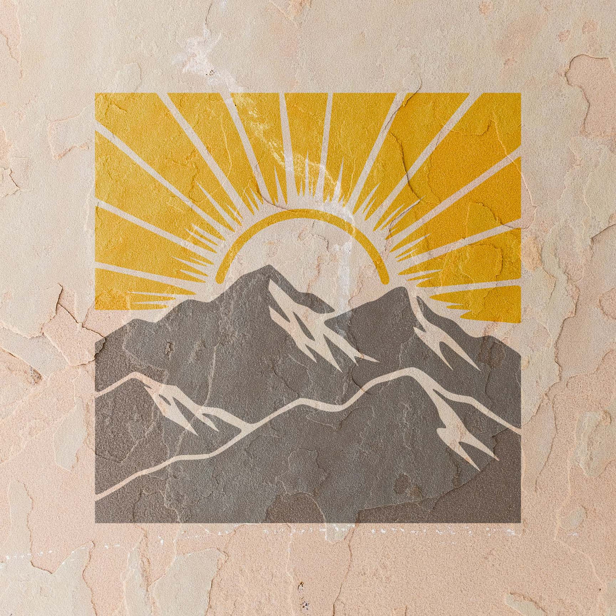 Across a textured wall, Sunrise Mountain Landscape Stencil shows gray peaks beneath a golden sun
