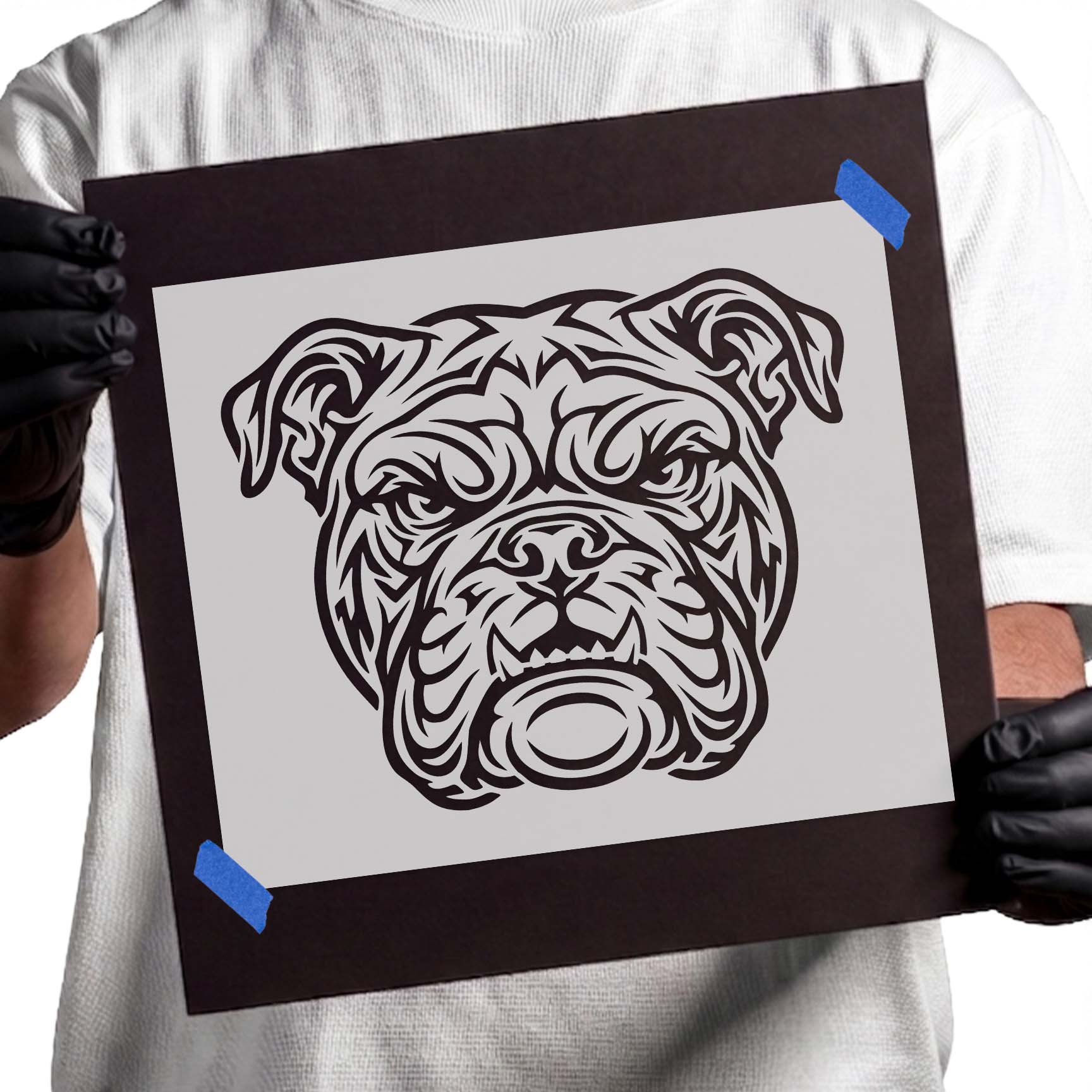 Bulldog face stencil with folded ears and flowing tribal linework
