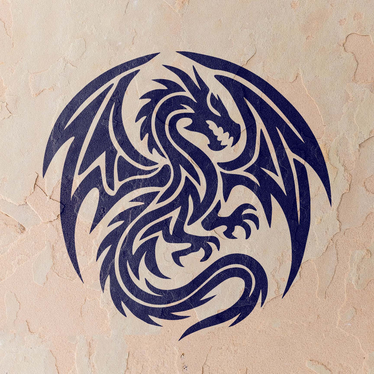 Fierce claws and sweeping wings define the Tribal Winged Dragon Stencil painted in deep blue on a beige stucco wall.