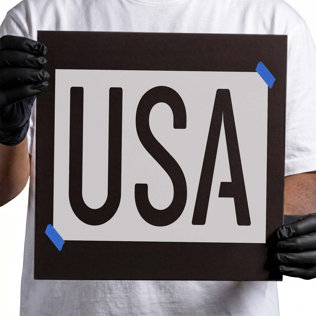 USA text stencil featuring three large uppercase letters with bold strokes and clean edges