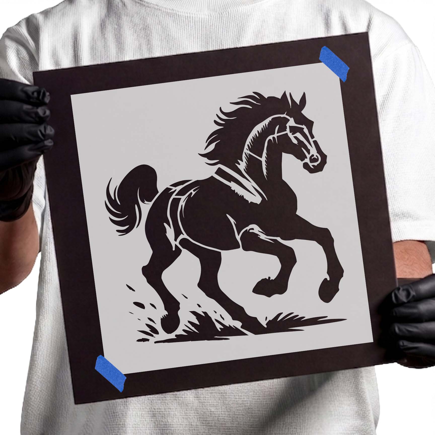 Running horse stencil with flowing mane and raised front legs
