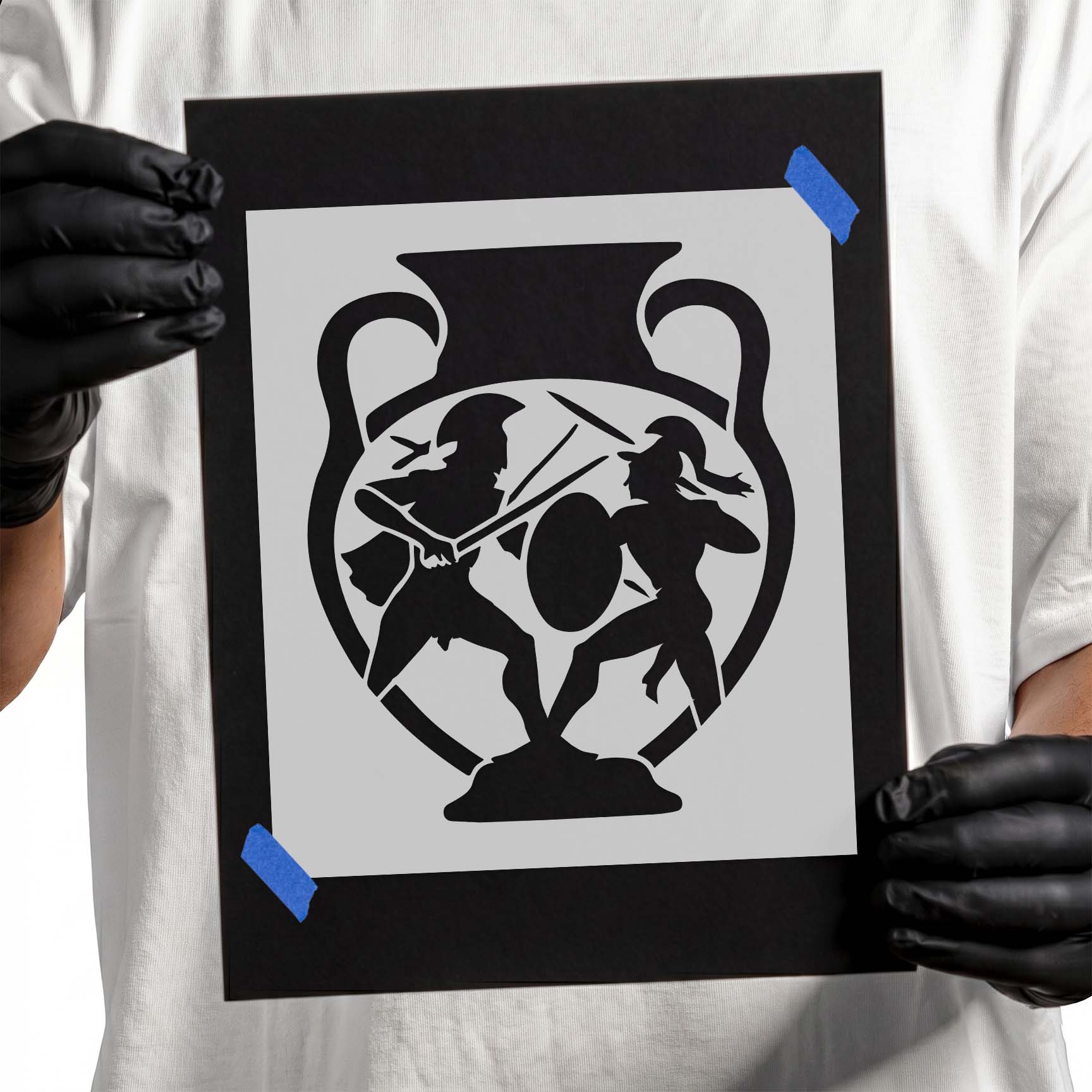 Greek vase stencil featuring two warriors with weapons and shields
