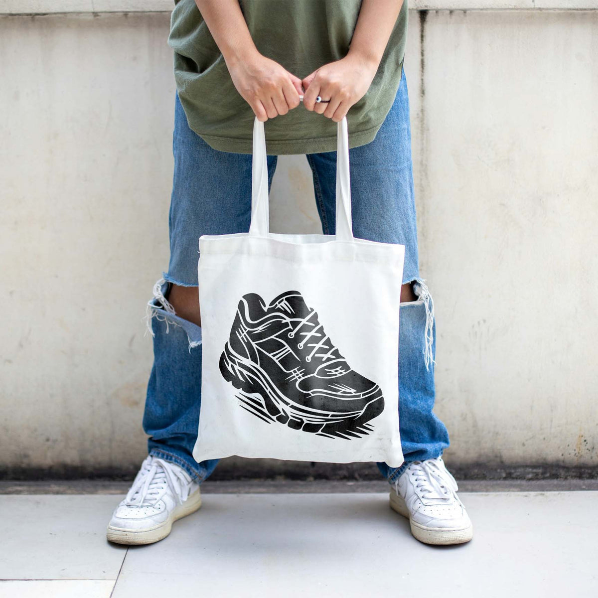 Athletic Running Shoe Stencil adds a detailed sneaker graphic to a white tote bag