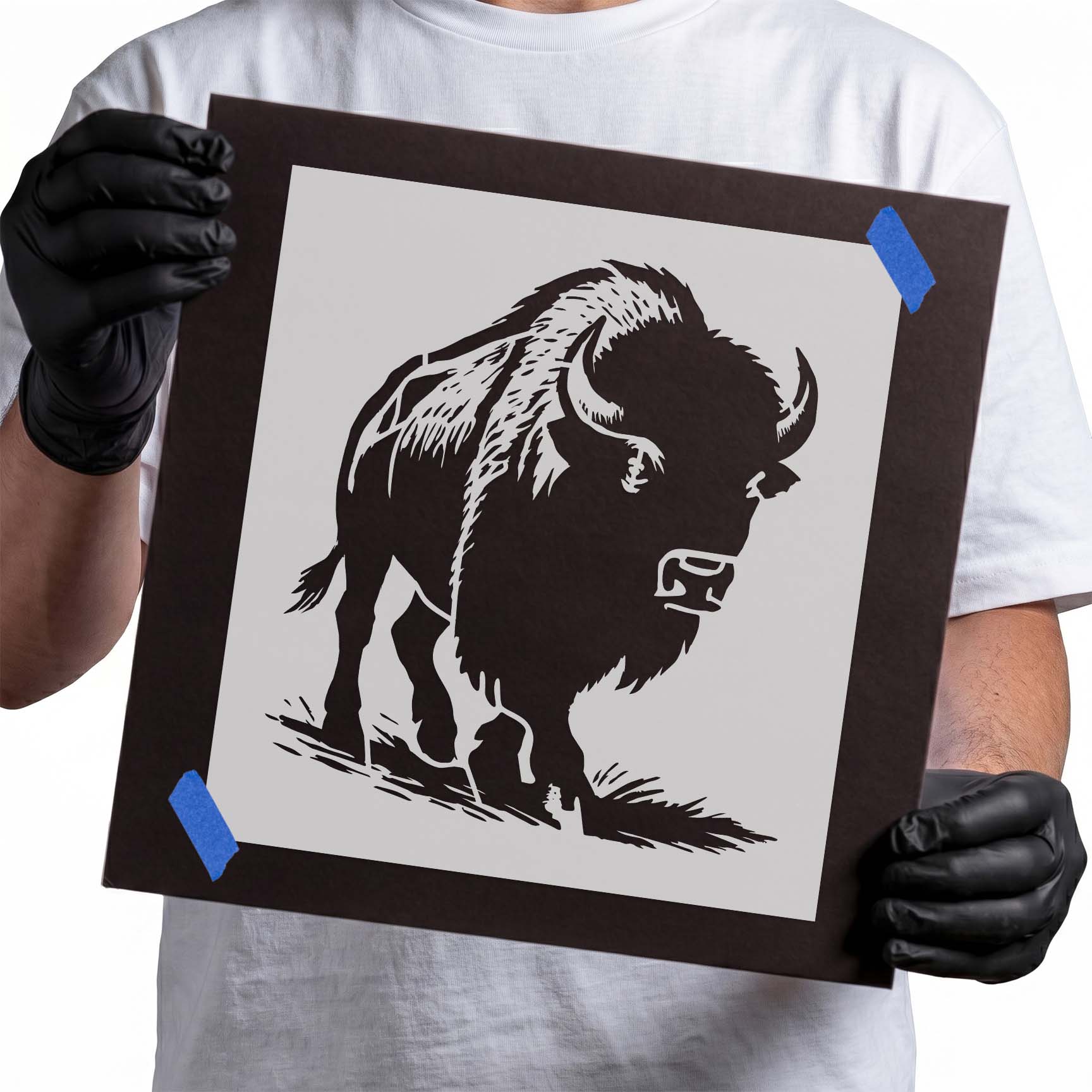 Buffalo walking across an open plain stencil

