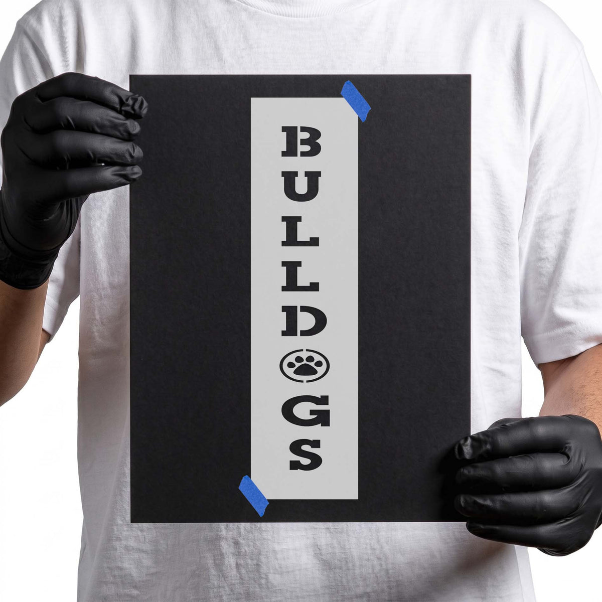 Bulldogs stencil featuring vertical block lettering with a paw print replacing the O