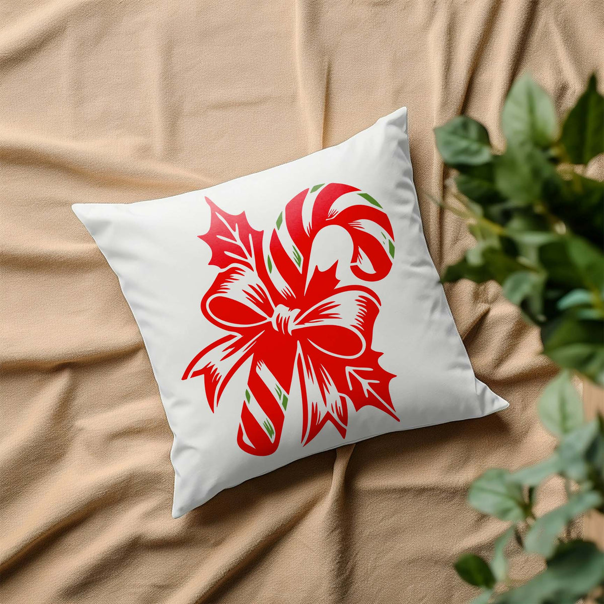 Candy Cane with Festive Bow Stencil decorates a white pillow with cheerful holiday detail