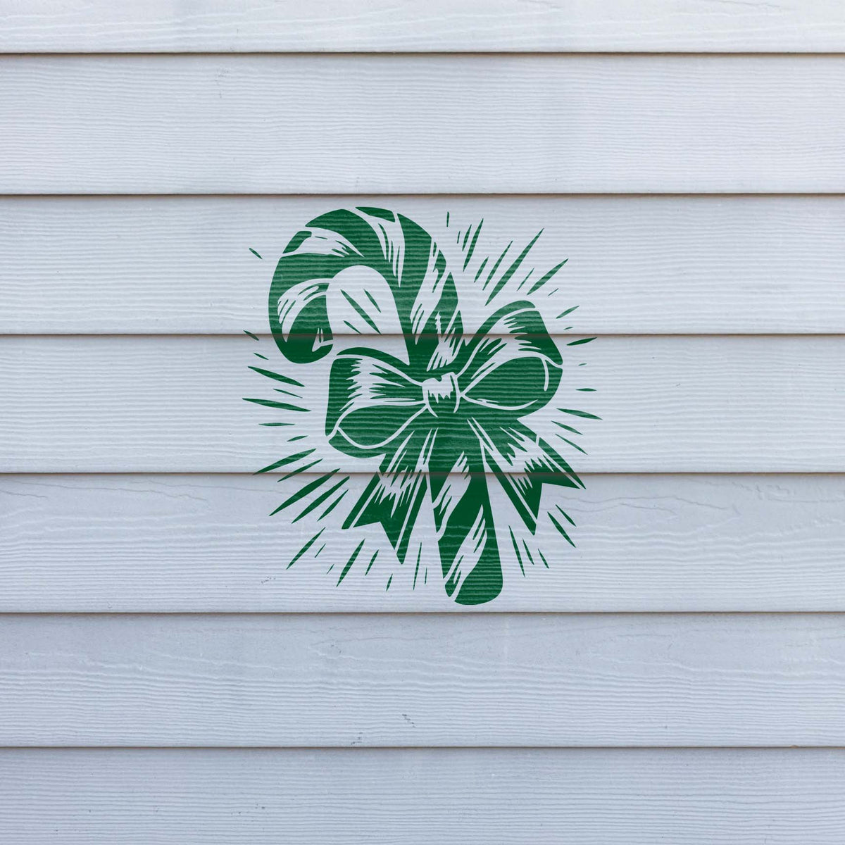 Candy Cane with Radiant Ribbon Stencil adds a crisp green holiday motif to white siding