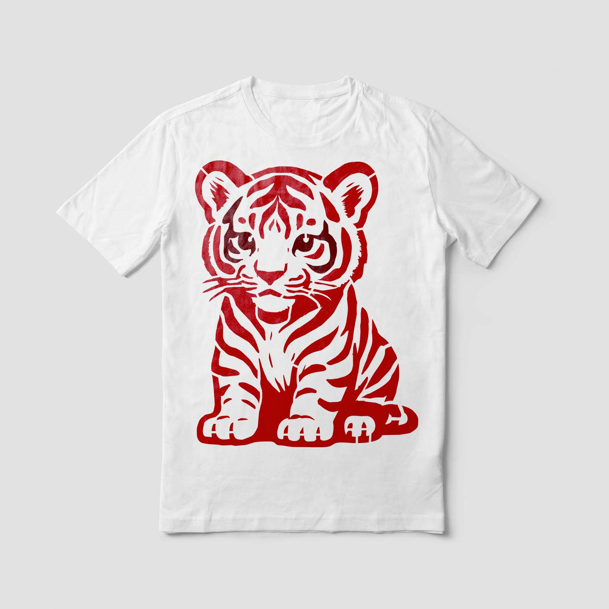 Cartoon Tiger Cub stencil printed red on a white T-shirt