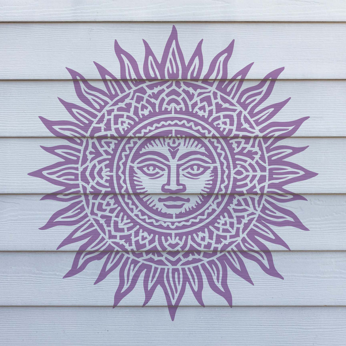 Intricate lavender rays surround the Celestial Mandala Sun Stencil on white horizontal siding.
