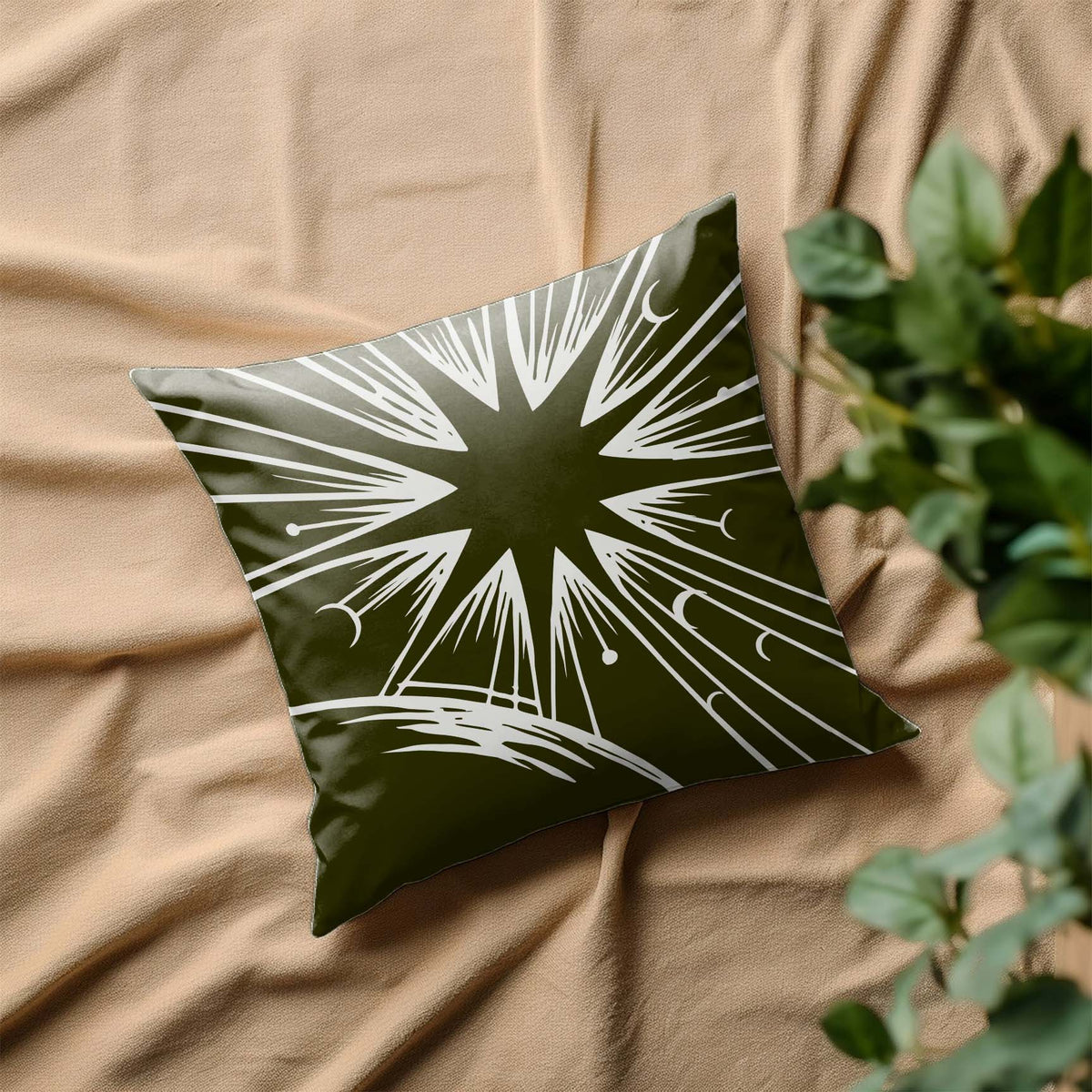 Celestial Sunburst Horizon Stencil decorates a dark pillow with cosmic rays and moons
