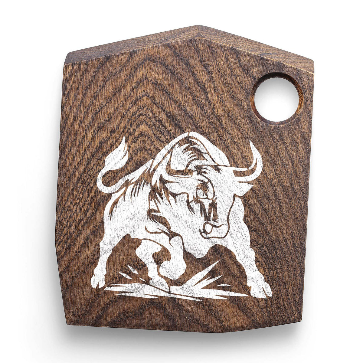 White Charging Bull Silhouette Stencil captures a muscular bull with lowered horns on a wooden cutting board.