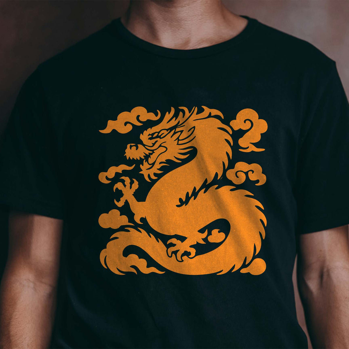 Chinese Dragon Long Body Stencil printed in orange on a black T-shirt.
