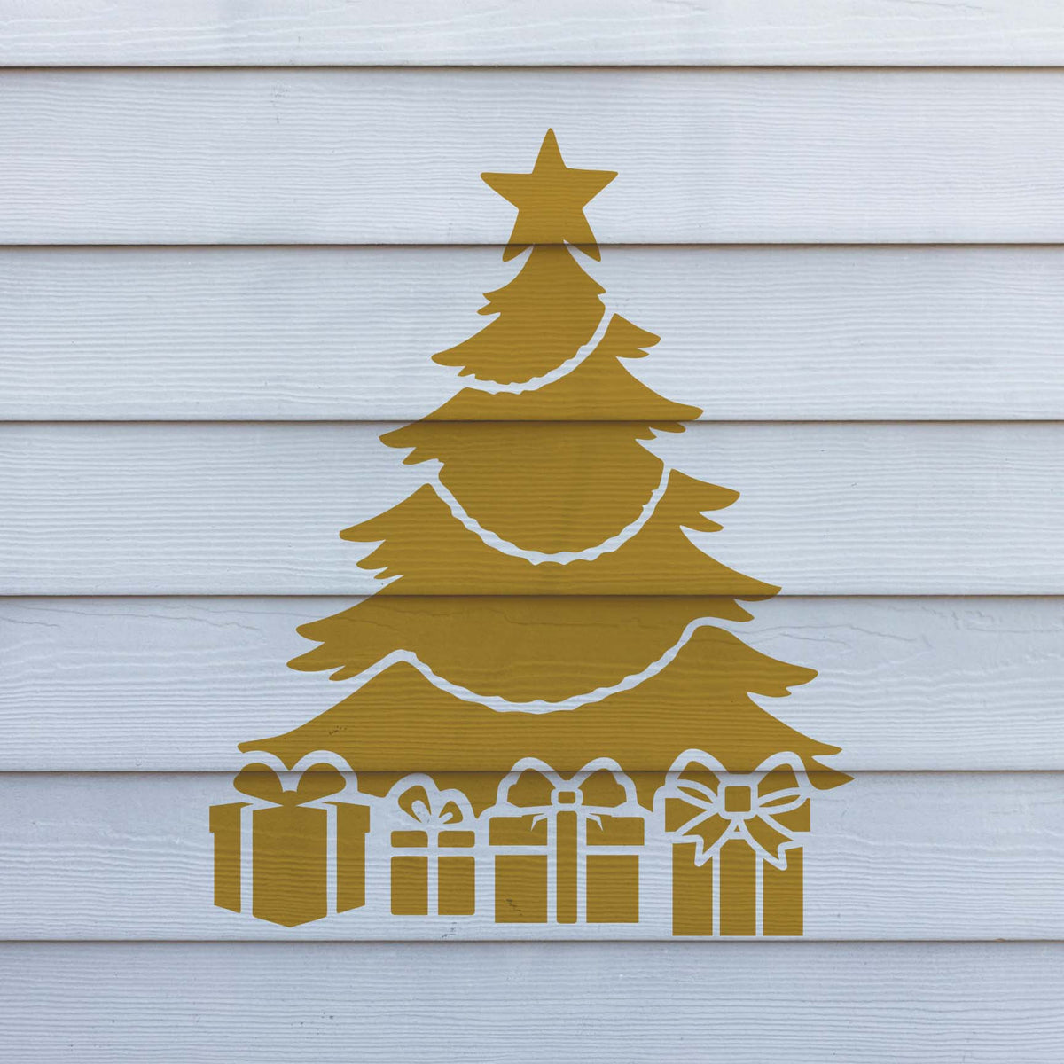 Golden Christmas Tree with Presents Stencil displayed on white siding for a festive outdoor look.