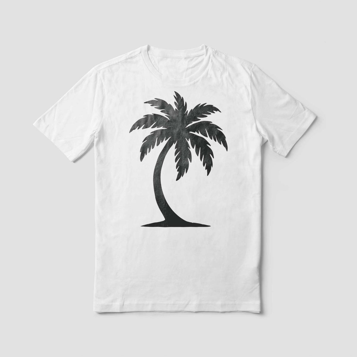 A bold black Classic Curved Palm Tree Silhouette Stencil stands out on a white T-shirt with tropical charm.