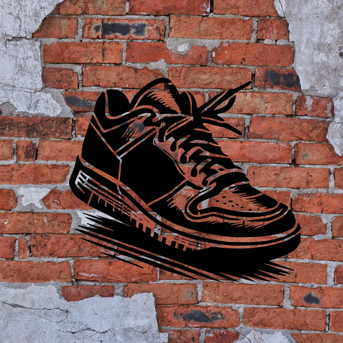 A bold black Classic Low Top Sneaker Stencil shows detailed laces and a thick sole on a weathered brick wall.