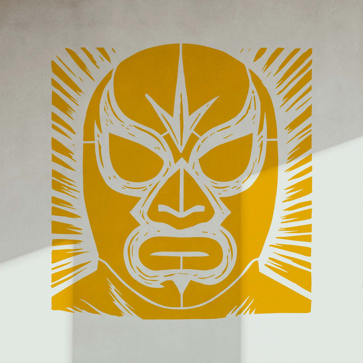 Sharp eyes and dramatic lines define the Classic Lucha Libre Wrestling Mask Stencil in yellow on a white wall.