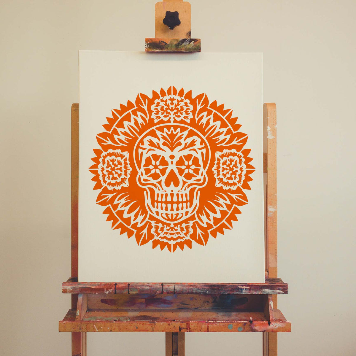 Orange Day of the Dead Sugar Skull Mandala Stencil blooms with floral details across a canvas