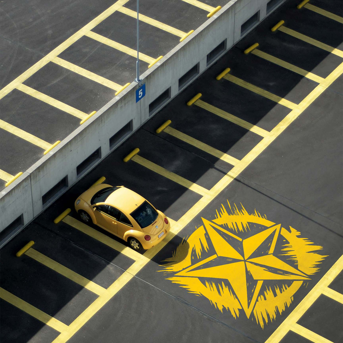 Distressed Army Star Stencil marks a parking lot with a rugged five-point star design