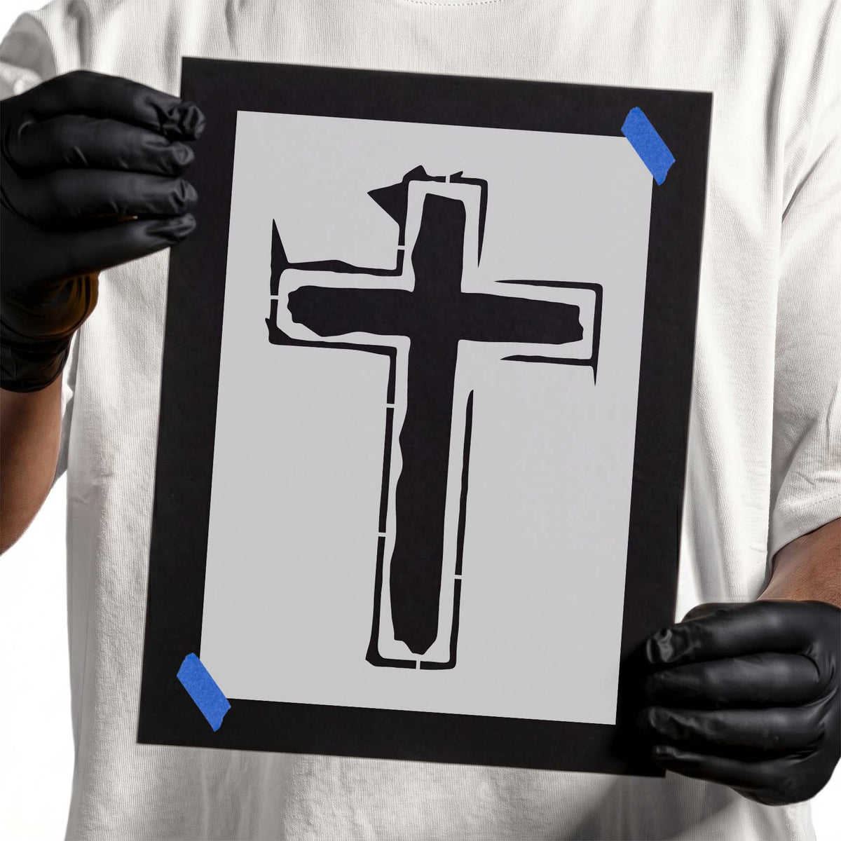 Distressed cross stencil with bold silhouette and rough outlined edges