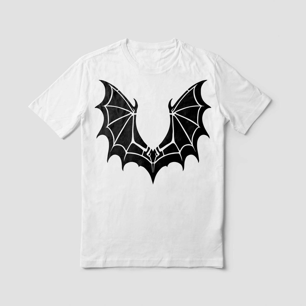 A striking pair of bat-like wings forms the Dragon Wing Emblem Stencil printed in black on a white T-shirt.