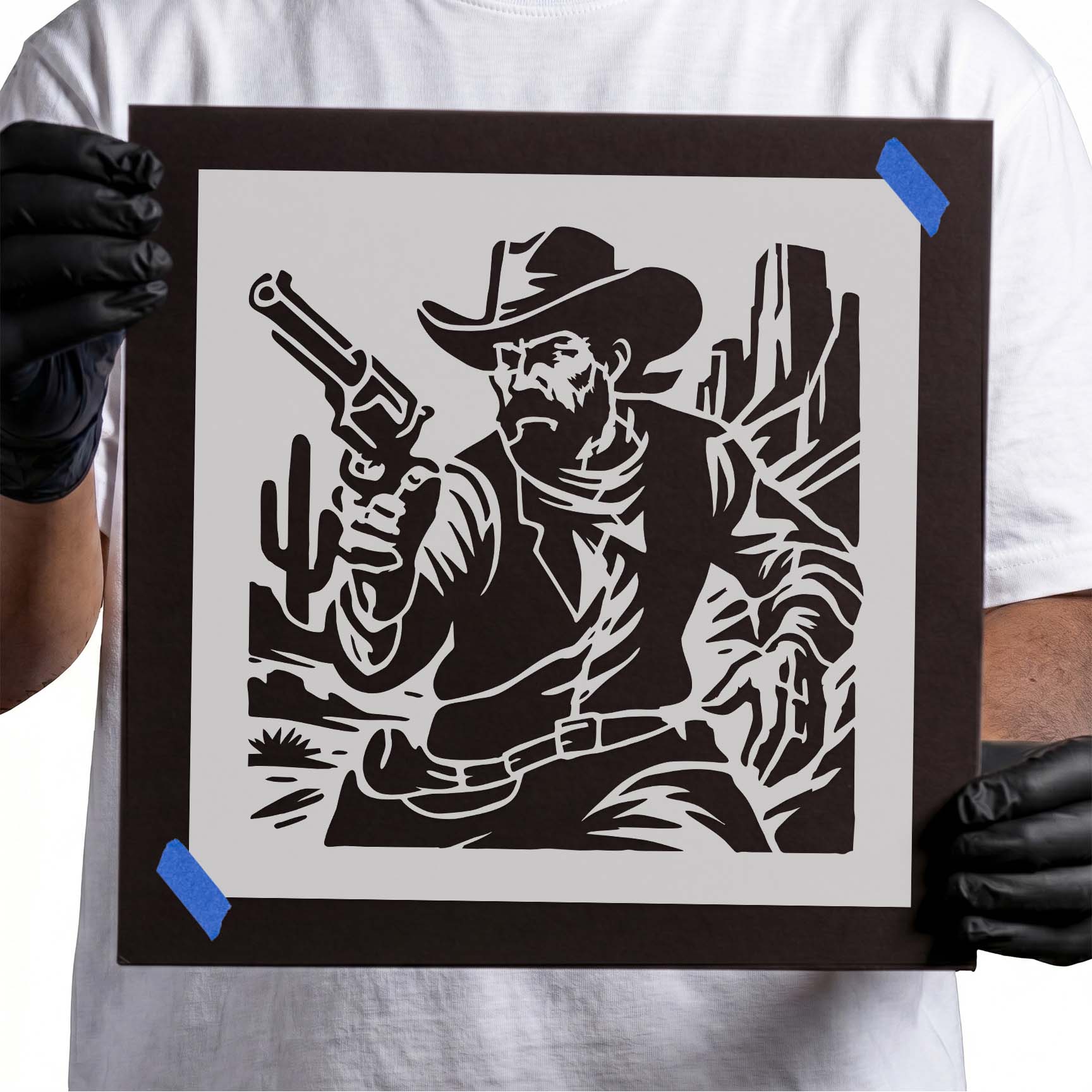Western cowboy stencil with revolver and desert cactus scene