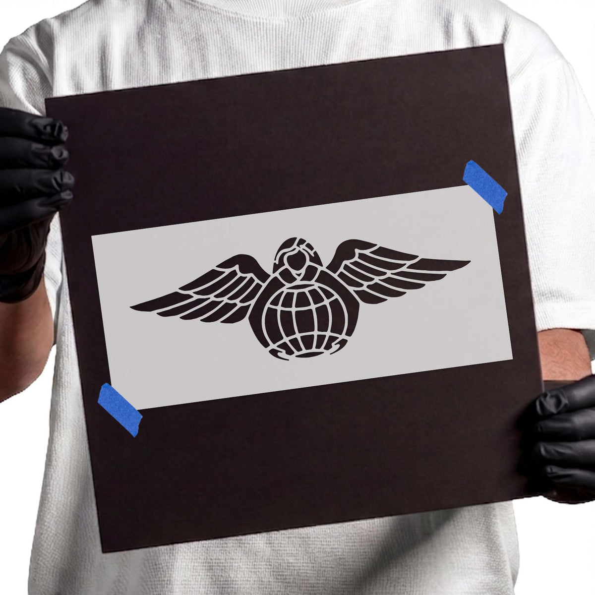 Earth Angel Stencil featuring a winged globe with a small angel figure
