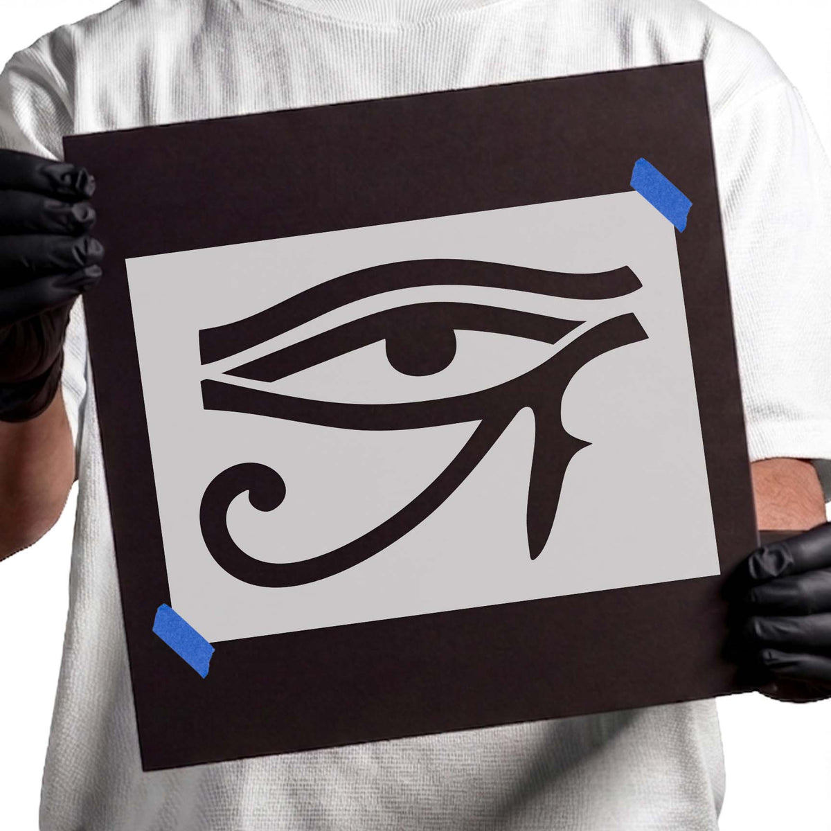 Egyptian Eye of Horus stencil with stylized eye and spiral detail