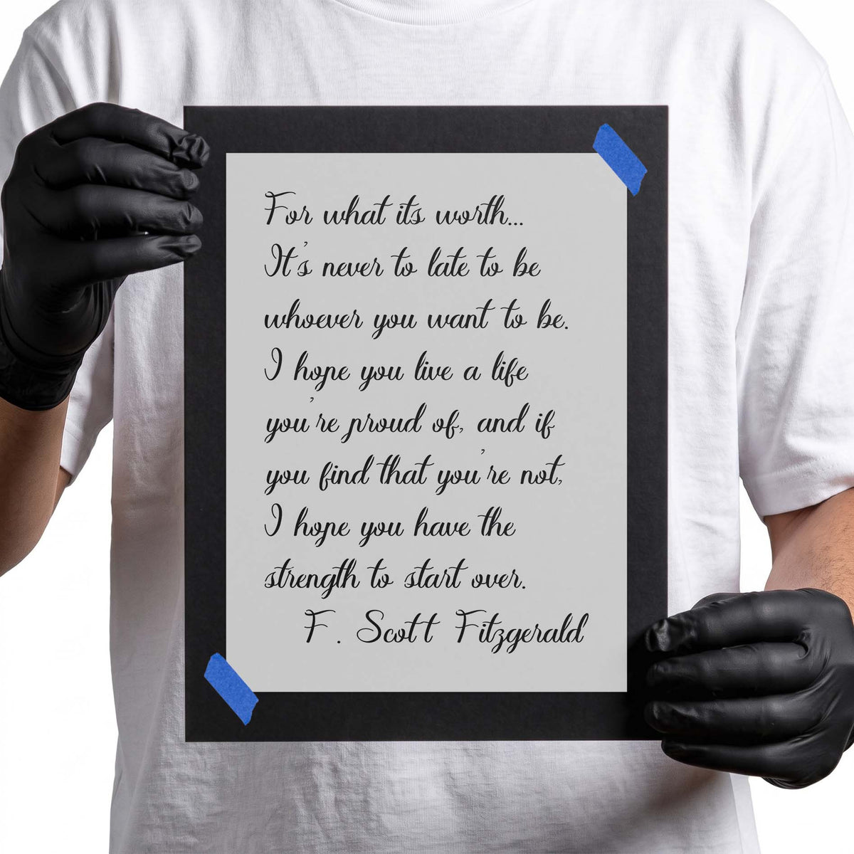 Inspirational quote stencil in flowing script with F. Scott Fitzgerald attribution