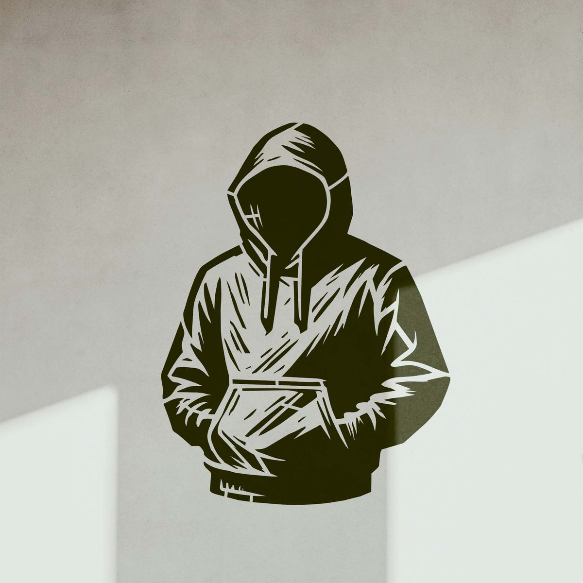 Faceless Hooded Figure Stencil in dark olive stands out on a clean white wall corner.