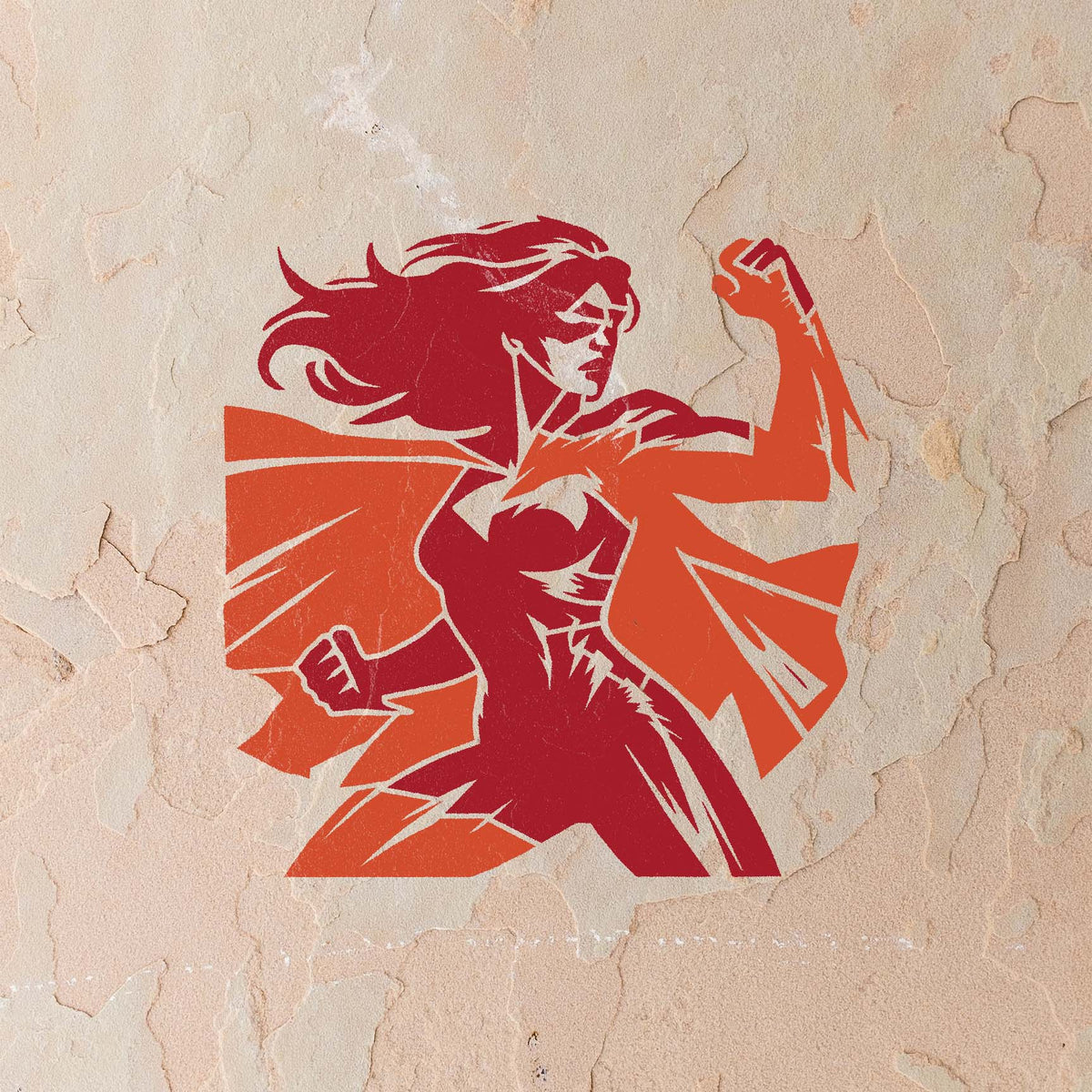 Red and orange Empowered Female Superhero Stencil stands strong on a weathered stucco wall
