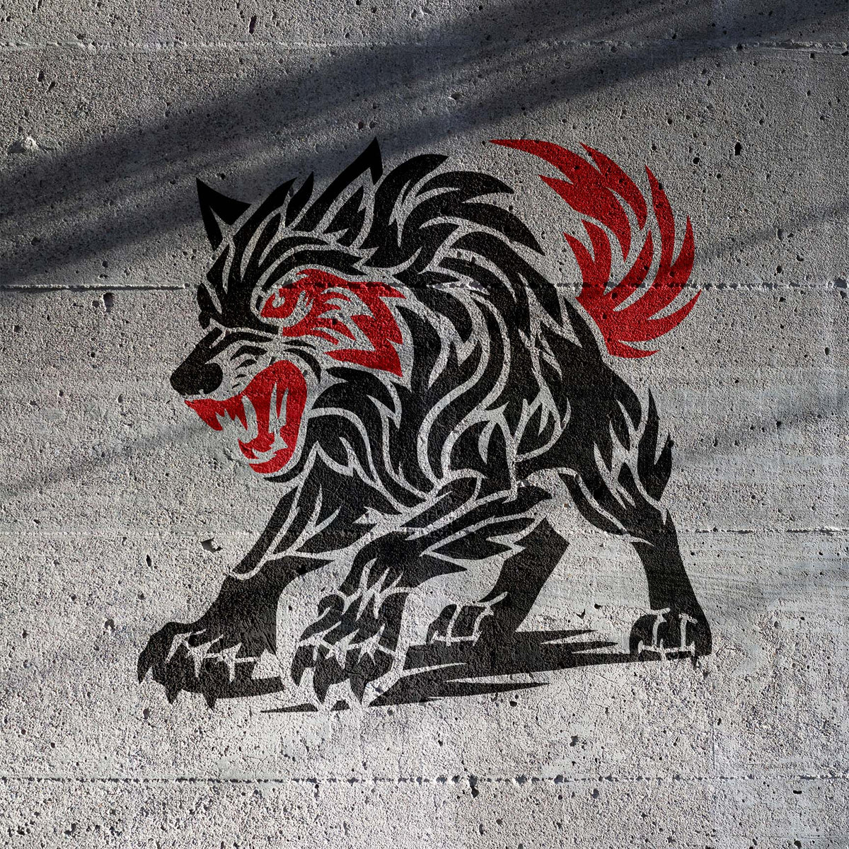 Fierce Tribal Wolf Stencil painted in black and red on concrete wall
