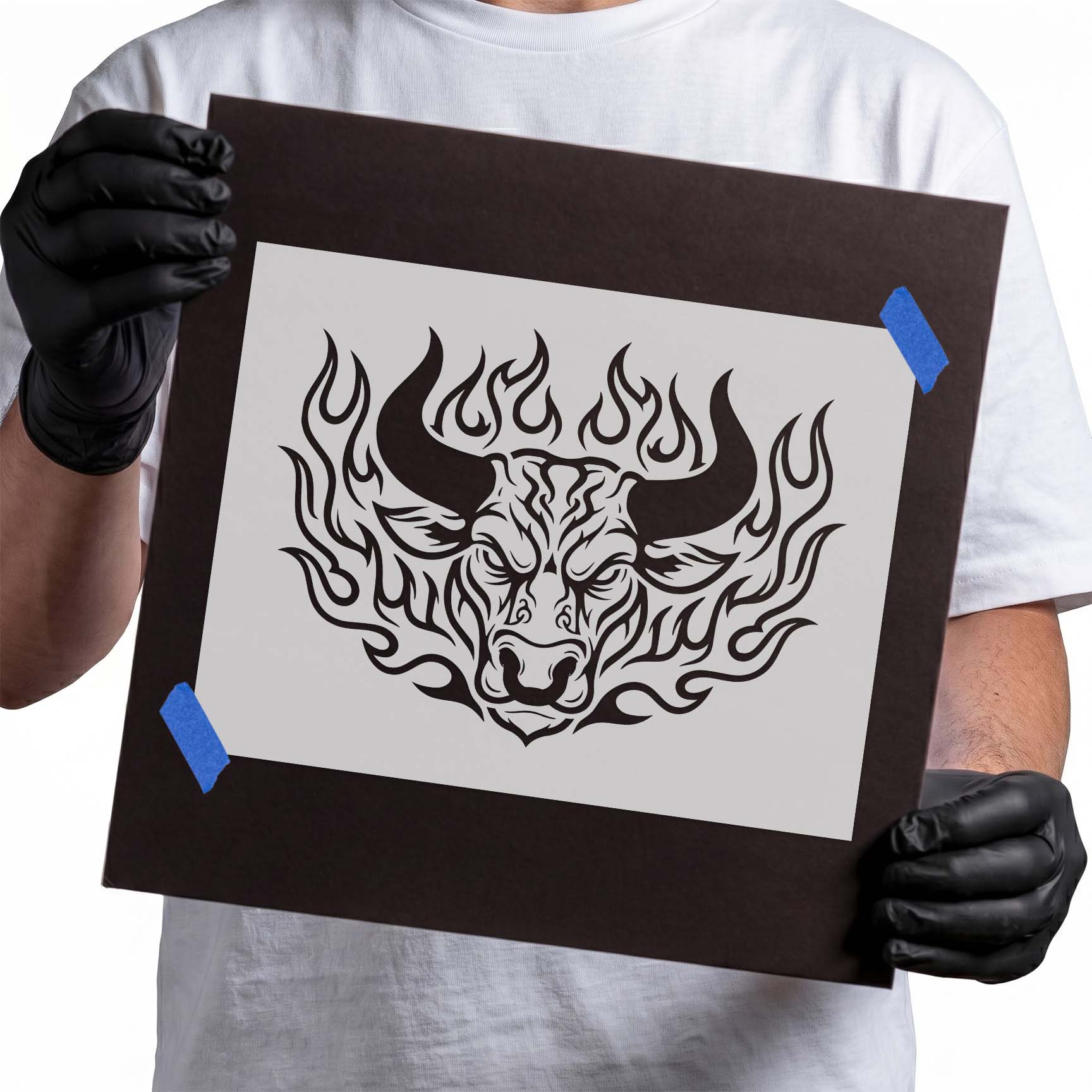 Bull head stencil with sweeping horns surrounded by curling flames