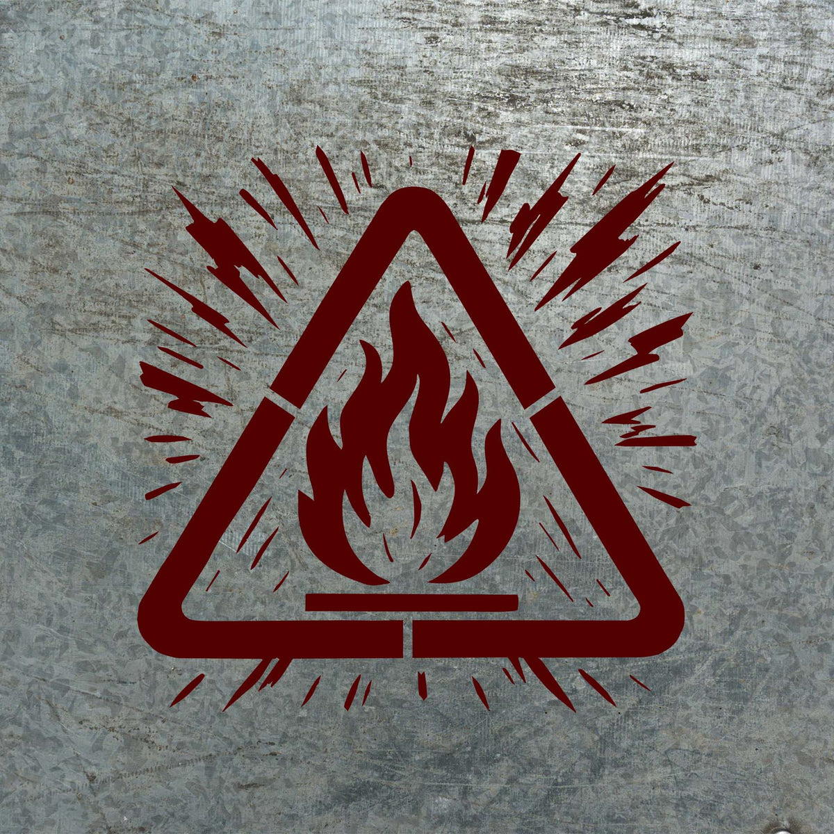 A bold red Flammable Hazard Warning Stencil stands out with a flame symbol on weathered metal.